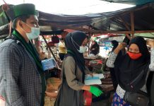 HMI Cabang BMR Bagikan Masker Gratis