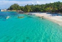 Pemdes Motongkad Selatan Lakukan Pengembangan Pantai Biscam Tampak salah satu pantai dengan airnya yang jernih di Kabupaten Boltim.