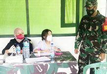 Kodim 1303/Bolmong Sukseskan Program Vaksinasi di Kabupaten Boltim Suasana pelaksanaan program vaksinasi di Kabupaten Boltim