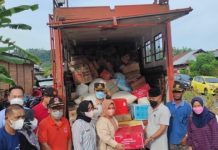 Pemkot Kotamobagu Serahkan Bantuan Korban Bencana Desa Motongkad
