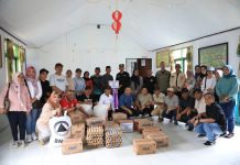 Pj Walikota Serahkan Bantuan Terdampak Banjir di Bolmut