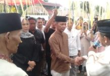 Pj Bupati dr. Jusnan Calemento Mokoginta MARS Silahturahmi Keluarga Desa Bintau
