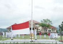 Pj Bupati Irup Penurunan Bendera Merah Putih