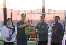 Pj Walikota Serahkan Bantuan ke Kabupaten Bolsel